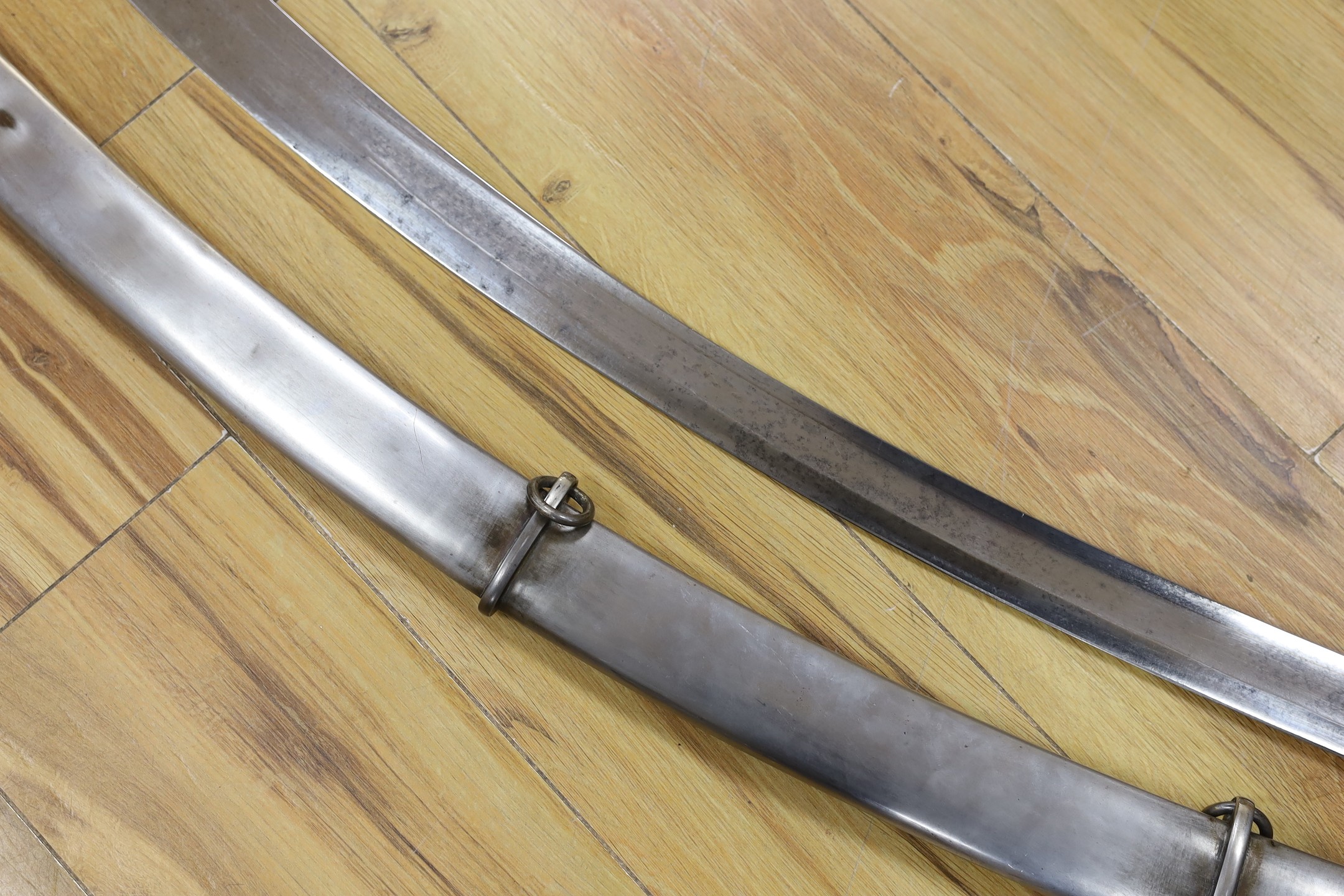 A British pattern 1796 light cavalry sabre, ‘W.S.R.’ engraved to hilt and ‘Bats’? to spine, with steel scabbard. 99cm total length